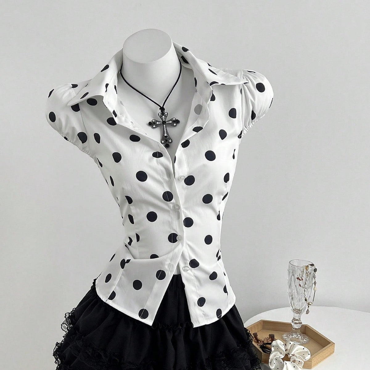 Polka dot printed lace up waist cinching short sleeved women's shirt