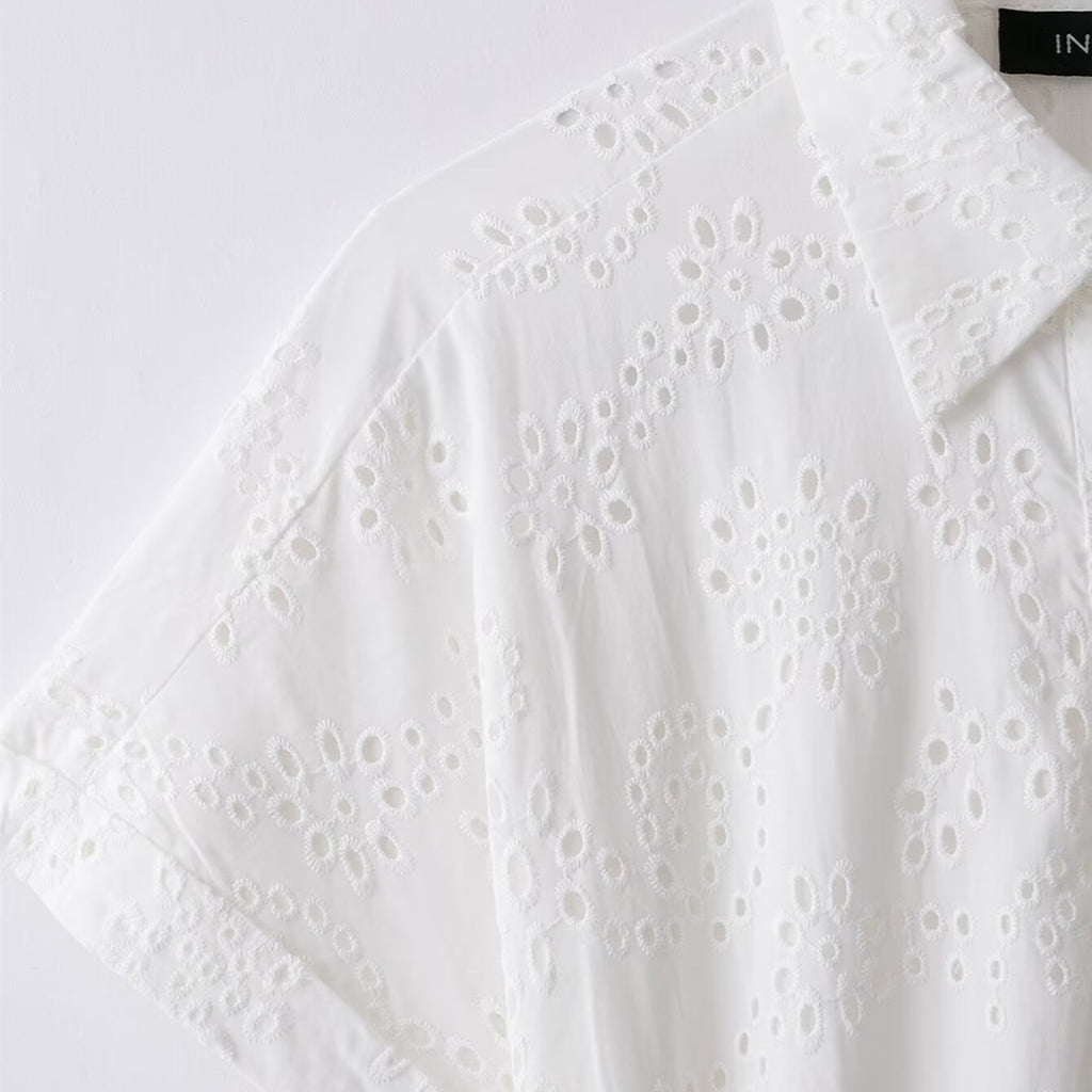 Elegant hollowed out embroidered dress