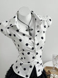 Polka dot printed lace up waist cinching short sleeved women's shirt