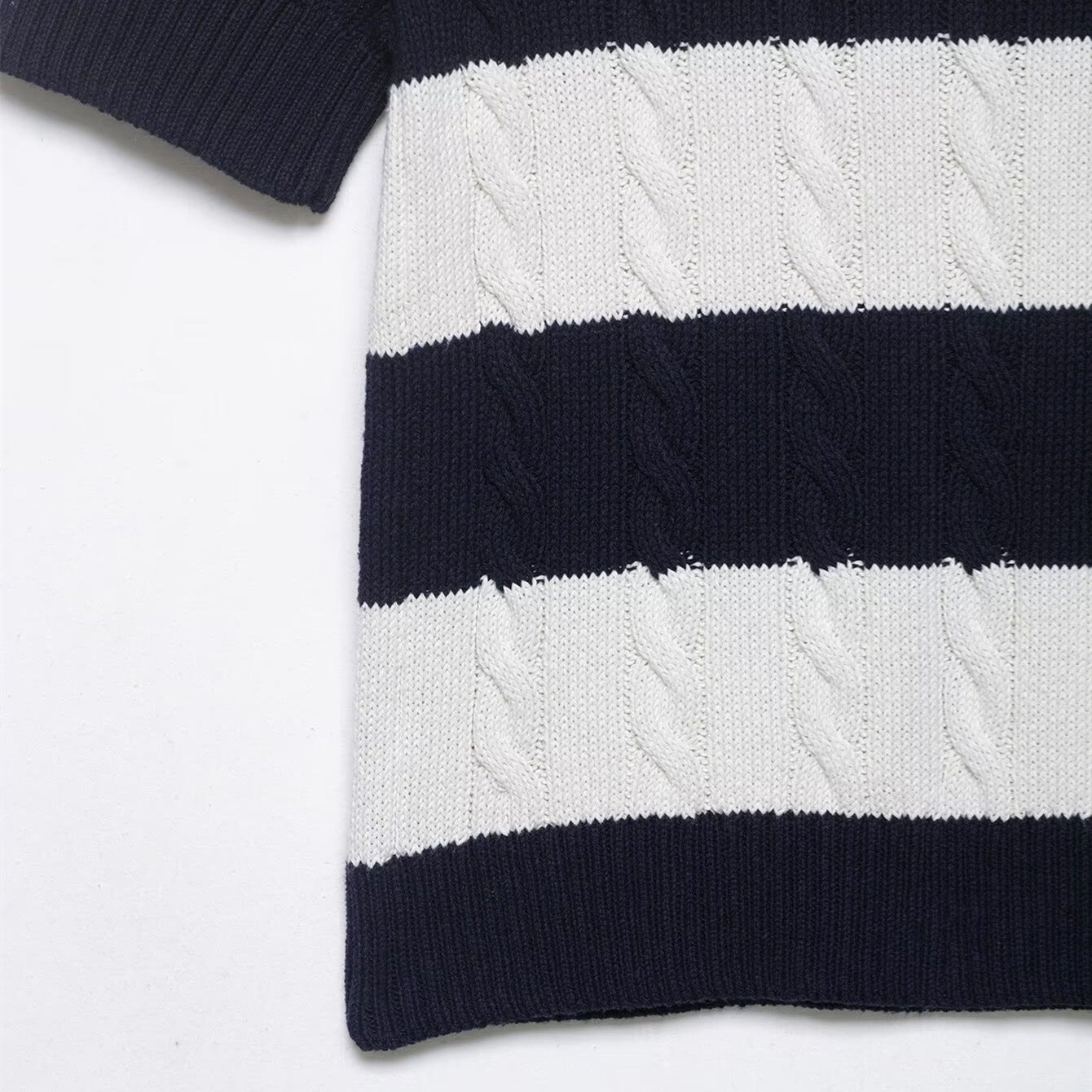 Minimally striped eight strand knitted sweater