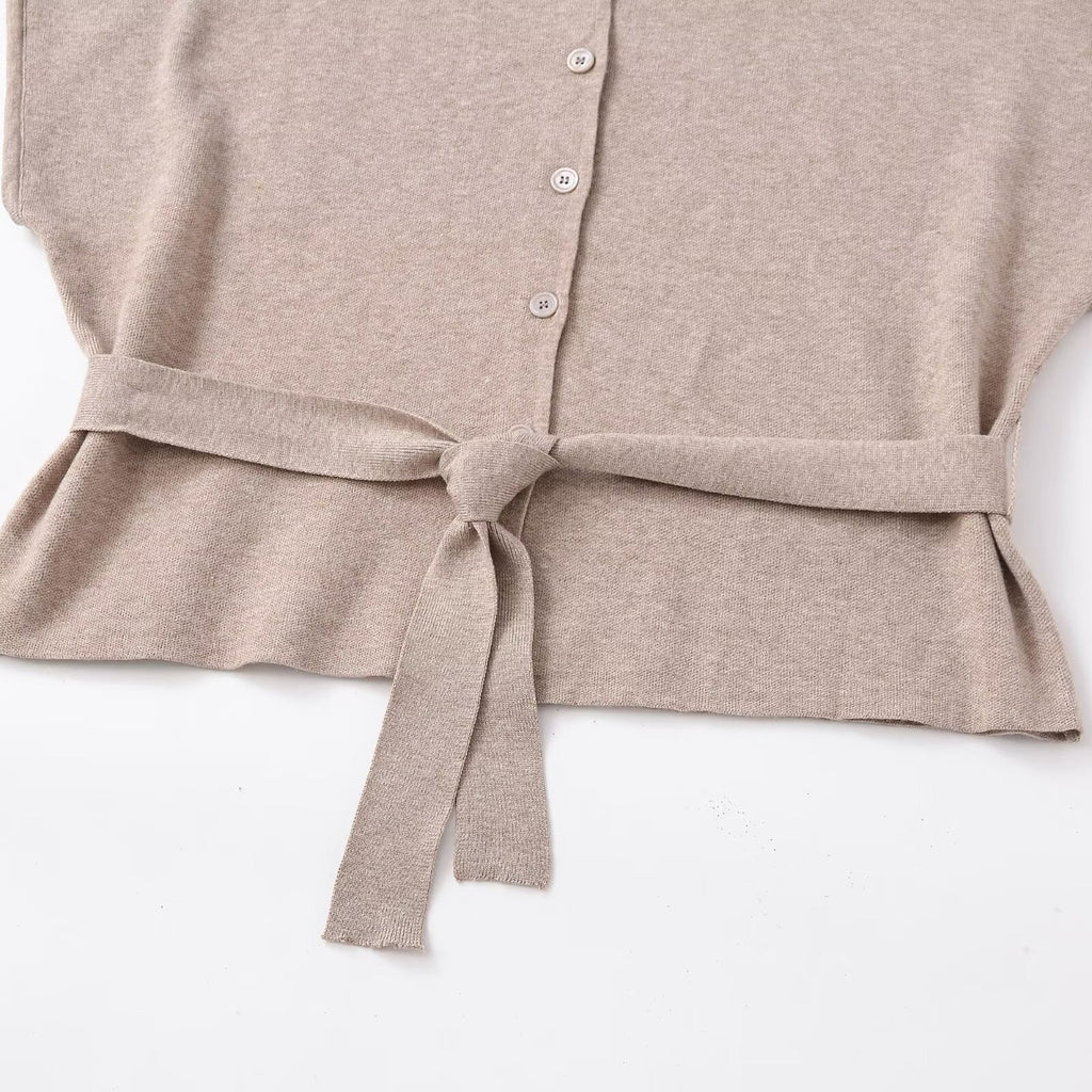 Round neck short sleeved knitted jacket with belt