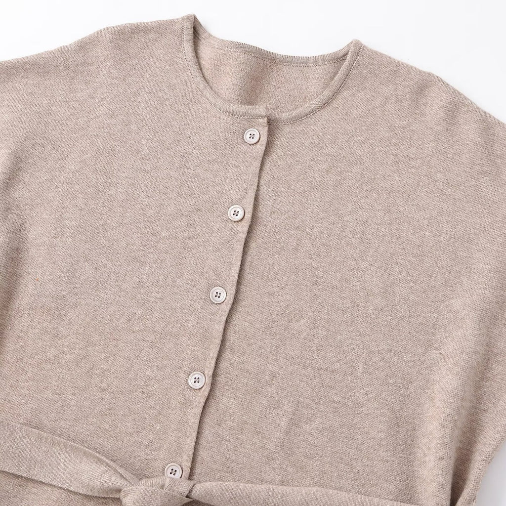 Round neck short sleeved knitted jacket with belt